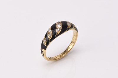 Lot 136 - A Victorian 18ct gold diamond and black enamel mourning ring