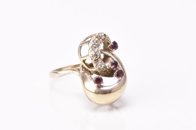 Lot 166 - An untested ruby and diamond dress ring