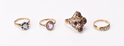 Lot 229 - Four stone set rings