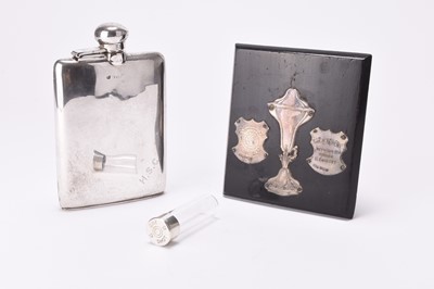 Lot 15 - A silver hip flask and a silver topped glass flask