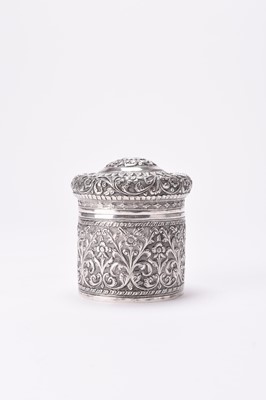 Lot 10 - An Indian Karachi Cutch white metal cannister and cover