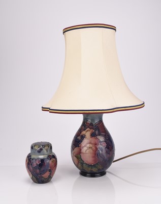 Lot 104 - A Moorcroft 'Blue Finches' table lamp with matching small ginger jar