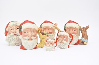 Lot 105 - Six Royal Doulton Santa Claus character jugs