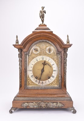 Lot 524 - A German gilt metal mounted oak bracket clock, circa 1900