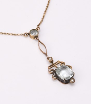 Lot 211 - An early 20th century aquamarine and split seed pearl pendant on chain