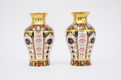 Lot 110 - A pair of Royal Crown Derby imari baluster vases, 1128