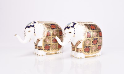 Lot 113 - A pair of Royal Crown Derby imari elephant paperweights