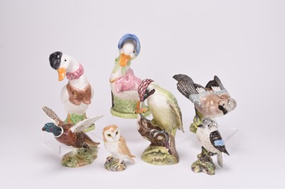 Lot 141 - A collection of Beswick models of birds together with assorted toby jugs