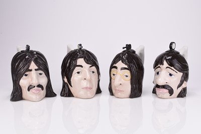 Lot A set of four Lorna Bailey Beatles teapots