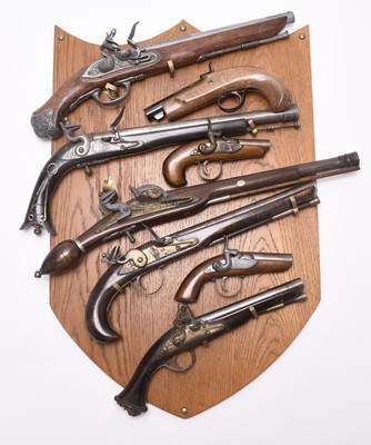 Lot 244 - A display board of replica dummy flintlock and...