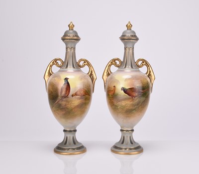 Lot 46 - A pair of S Fielding & Co Stoke-on-Trent vases and covers painted with pheasants