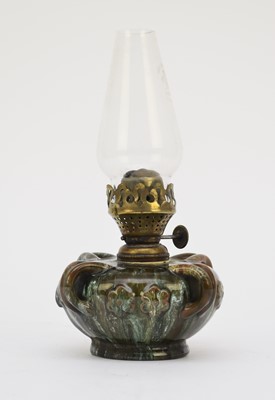 Lot 55 - Linthorpe art pottery oil lamp