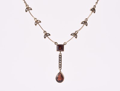 Lot 140 - An early 20th century style 9ct gold garnet and seed pearl necklace