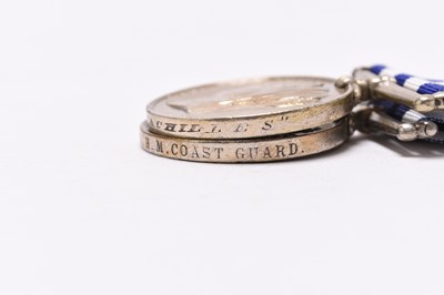 Lot 127 - A Victorian group of three Royal Navy / Coastguard medals, including Egypt 1882, with paperwork