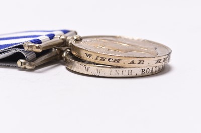 Lot 127 - A Victorian group of three Royal Navy / Coastguard medals, including Egypt 1882, with paperwork