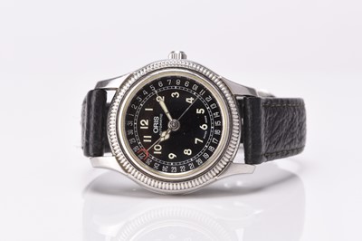 Lot 325 - Oris: A mid-size stainless steel calendar wristwatch