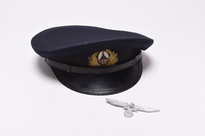 Lot 188 - WW2 German Veteran's Organisation visor cap and a breast eagle