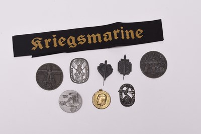 Lot 190 - A small group of German Third Reich day badges and tinnies and a Kriegsmarine cap tally