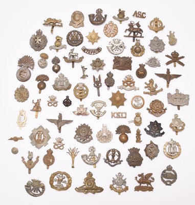 Lot 204 - A large collection of British military cap badges