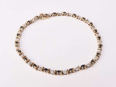 Lot 294 - A 9ct gold sapphire and diamond bracelet