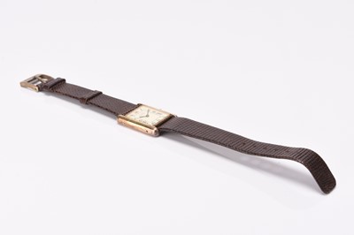 Lot 326 - Cartier: A lady's silver gilt Must de Tank wristwatch