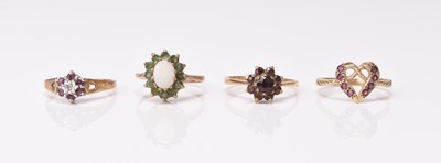 Lot 143 - Four 9ct gold stone set rings