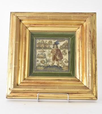 Lot 509 - A 17th century stumpwork fragment of a king in landscape