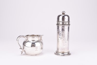 Lot 6 - An Arts & Crafts silver sugar caster and a silver cream jug