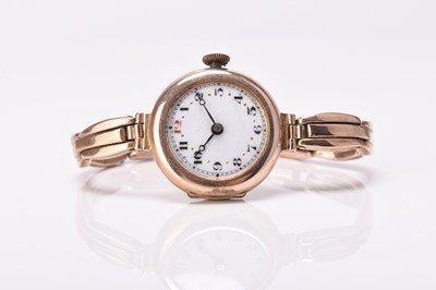 Lot 320 - Etna: A lady's 9ct gold bracelet watch