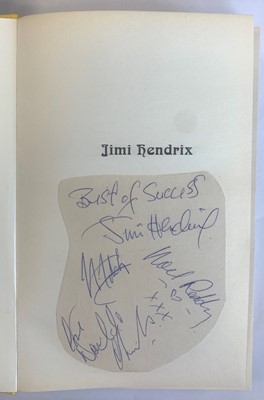 Lot 54 - HENDRIX, Jimi (1942-70) autograph on a piece of paper pasted to the half title of book