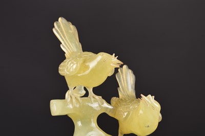 Lot 151 - A Chinese bowenite carving of birds on a tree branch