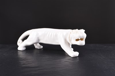 Lot 189 - A Chinese white glazed figure of a tiger, 20th century