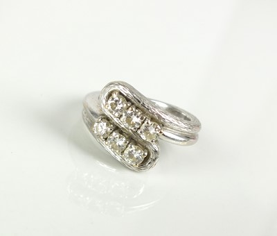 Lot 219 - A six stone diamond ring