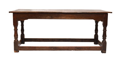 Lot 389 - A late 17th century oak refectory type dining table