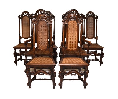 Lot 177 - A set of eight William & Mary style carved oak high-back dining chairs