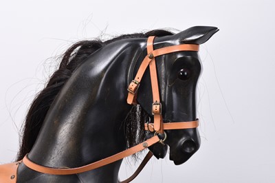Lot 359 - A large Deborah Fownes carved wood rocking horse