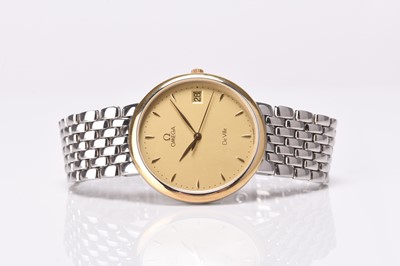 Lot 328 - Omega: A gentleman's stainless steel and gilt De Ville bracelet watch