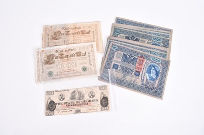 Lot 249 - Stamps, share certificates and bank notes; an accumulation of stamps on and off paper in packets plus 2 albums