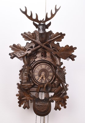 Lot 523 - A German Black Forest cuckoo clock