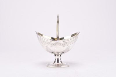 Lot 25 - A Victorian silver swing handled basket