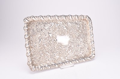 Lot 78 - An Edwardian silver dressing table tray