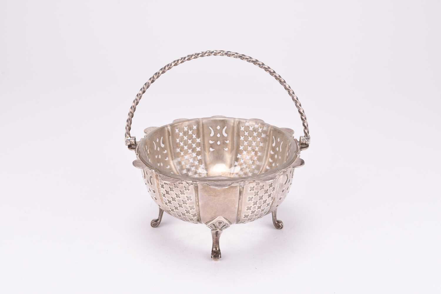 Lot 100 - A Victorian silver sugar basket