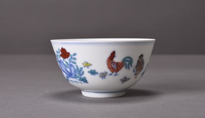 Lot 60 - A Chinese Doucai porcelain chicken cup, Chenghua mark but later