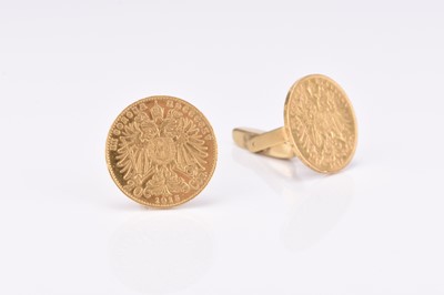 Lot 247 - A pair of 20 Mark coin set cufflinks