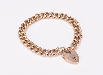 Lot 115 - A rose metal curb link bracelet