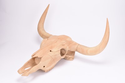 Lot 111 - A contemporary carved beech wood longhorn steer skull