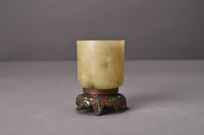 Lot 152 - A Chinese nephrite jade and enamelled bronze beaker vase