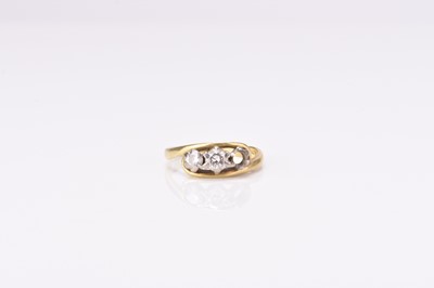 Lot 180 - A two stone diamond ring