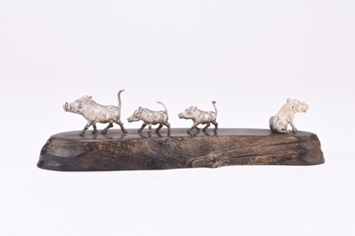 Lot 21 - A Patrick Mavros silver model group of a family of Warthogs