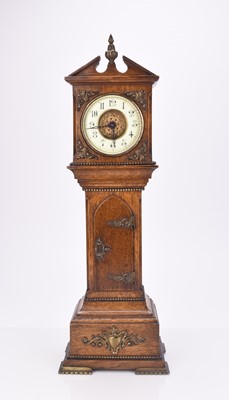 Lot 525 - A French novelty 'longcase' mantel timepiece